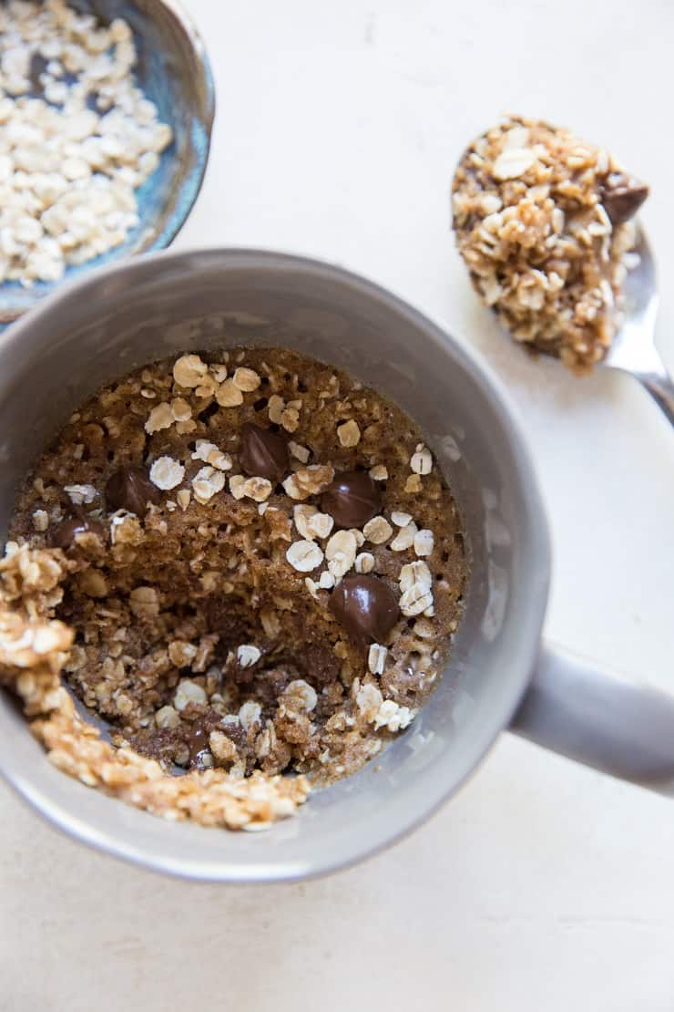 4-Ingredient Oatmeal Cookie in a Mug with a bite taken out