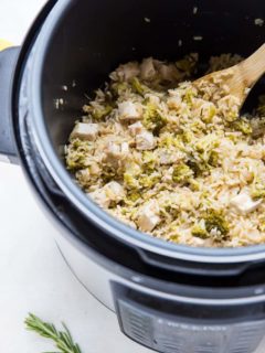 Perssure cooker with Rosemary Lemon Instant Pot Chicken and Rice in it