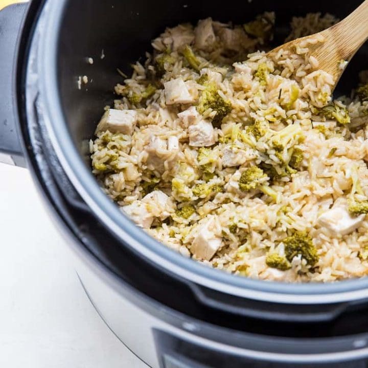 Perssure cooker with Rosemary Lemon Instant Pot Chicken and Rice in it