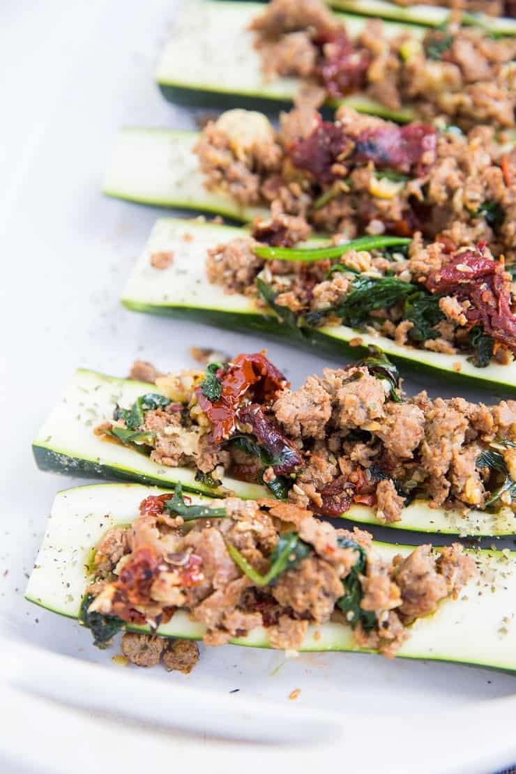 Stuffed Zucchini with Turkey Italian Sausage, Sun-Dried Tomatoes, and Spinach - a clean, healthy paleo and keto dinner recipe!