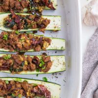 Stuffed Zucchini with Turkey Italian Sausage, Sun-Dried Tomatoes, and Spinach - a clean, healthy paleo and keto dinner recipe!