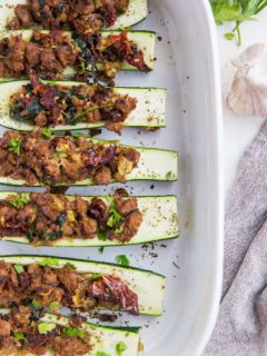 Stuffed Zucchini with Turkey Italian Sausage, Sun-Dried Tomatoes, and Spinach - a clean, healthy paleo and keto dinner recipe!