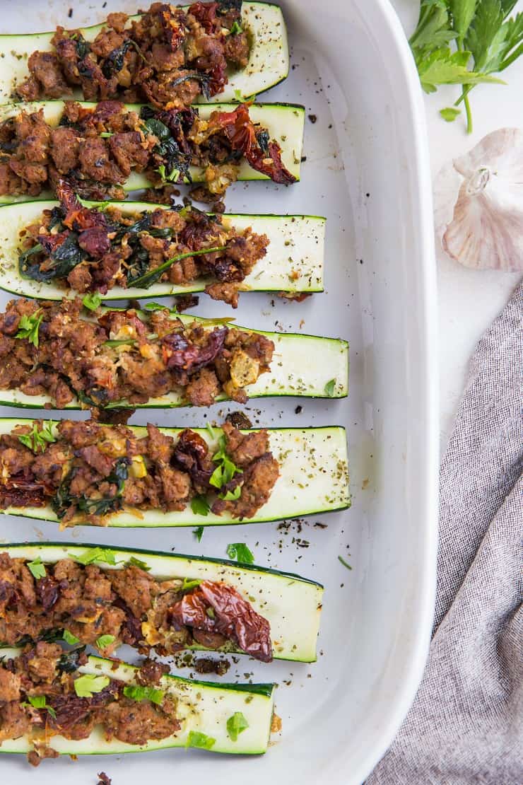 Stuffed Zucchini with Turkey Italian Sausage, Sun-Dried Tomatoes, and Spinach - a clean, healthy paleo and keto dinner recipe!