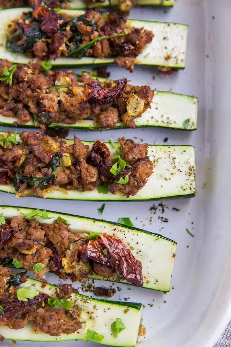 Stuffed Zucchini with Turkey Italian Sausage, Sun-Dried Tomatoes, and Spinach - a clean, healthy paleo and keto dinner recipe!
