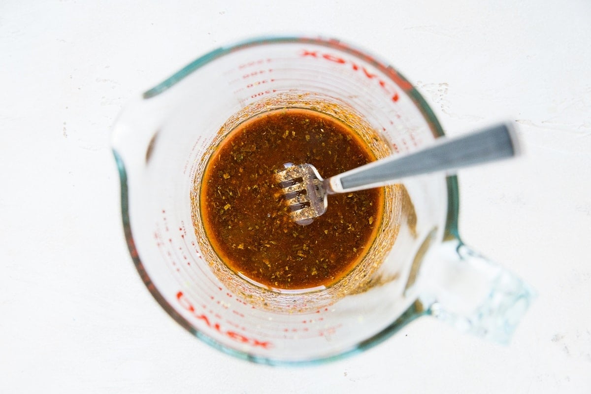 Chili lime marinade mixed up in a measuring cup for any type of seafood or chicken.