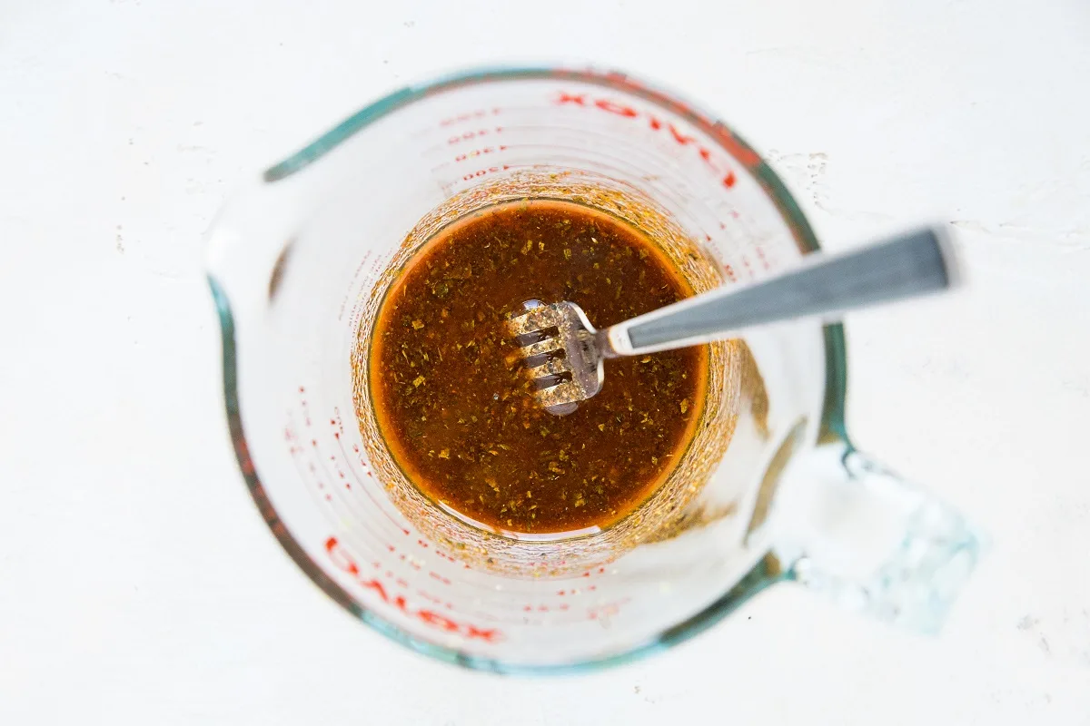 Chili lime marinade mixed up in a measuring cup for any type of seafood or chicken.