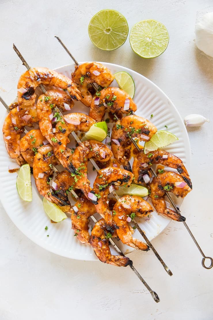 Chili Lime Grilled Shrimp Skewers - sweet and tangy glazed grilled shrimp made with only a few basic ingredients. A delicious paleo, keto, healthy low-carb appetizer or main entree for summer grilling.