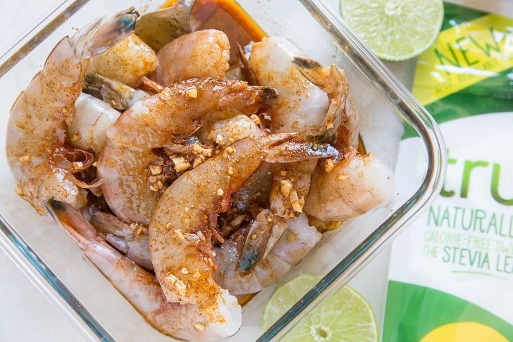 shrimp marinating in a container