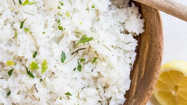 Zesty Buttery Lemon Rosemary Rice with sauteed onion and garlic is a flavorful side dish for any meal