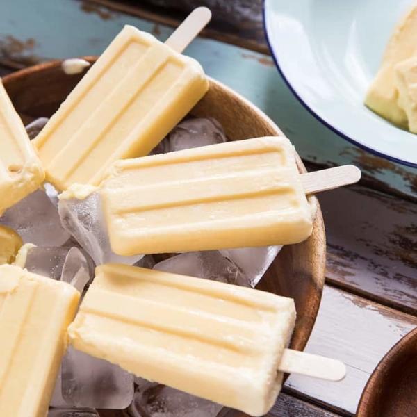 2-Ingredient Orange Creamsicles - a no-bake frozen dessert recipe that is vegan and paleo. Healthy popsicles for summer!