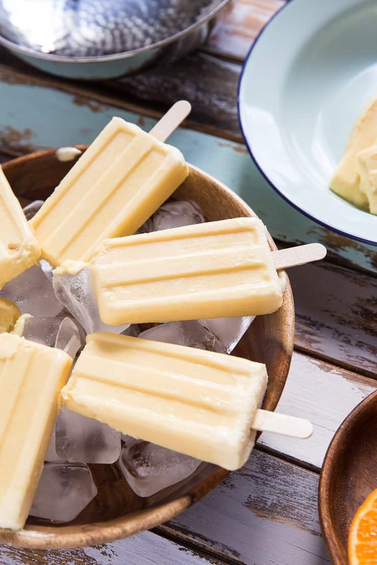 2-Ingredient Orange Creamsicles - a no-bake frozen dessert recipe that is vegan and paleo. Healthy popsicles for summer!