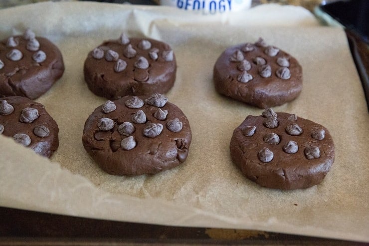 Raw black bean cookie dough on a cookie sheet