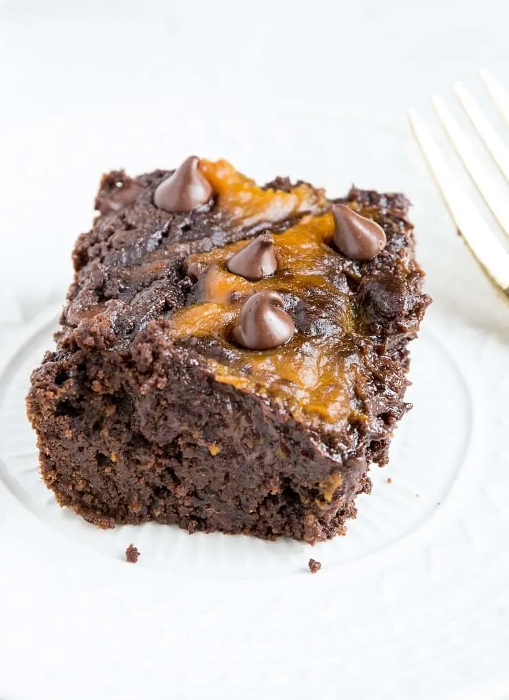 Gluten-Free Pumpkin Swirl Brownies with a paleo grain-free option. Dairy-free, refined sugar-free, fudgy and delicious