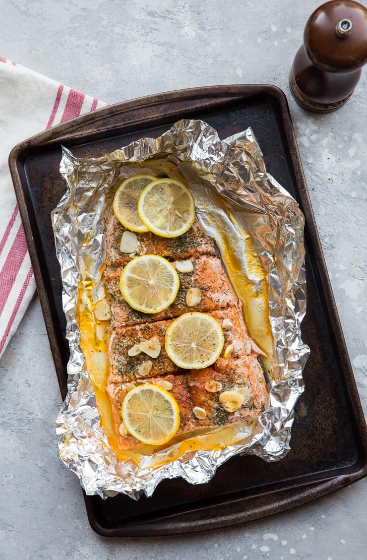 How to Bake Salmon in Foil with garlic and lemon - an easy dinner recipe that is healthy, paleo, keto, whole30, and delicious