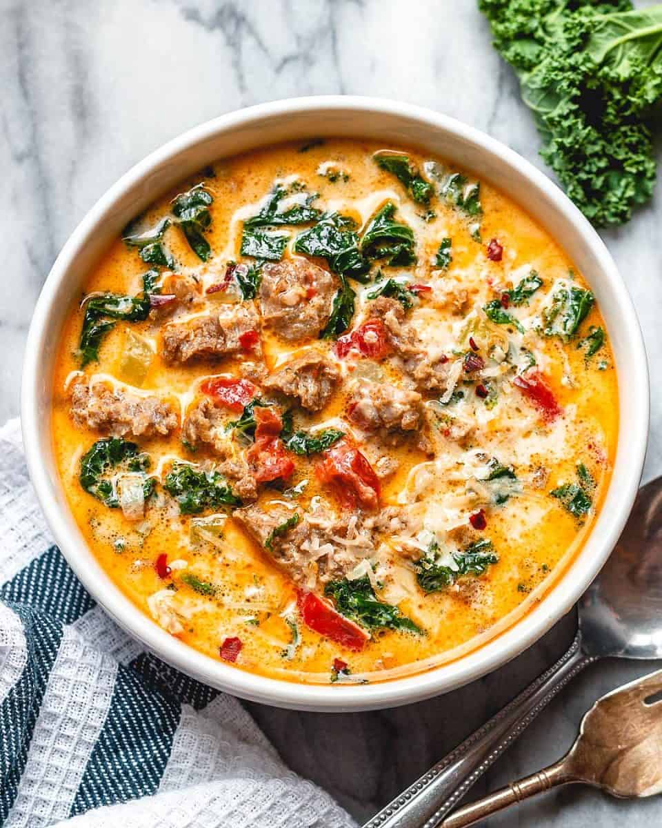 Instant Pot Keto Tuscan Soup from Eat Well 101 - Satisfying, creamy and comforting keto soup recipe! This Keto Tuscan Soup includes Italian Sausage for a flavorful healthy meal.