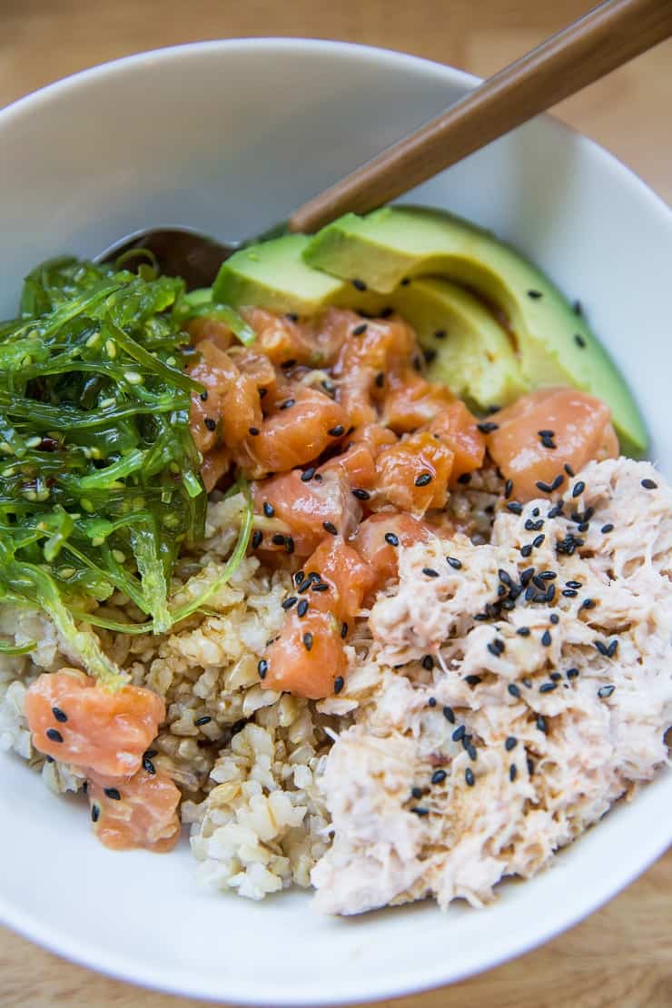 Salmon Poke Bowls with Crab Salad, seaweed salad, and avocado - a nutritious, delightful sushi at home experience