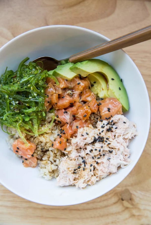 Salmon Poke Bowls with Crab Salad, seaweed salad, and avocado - a nutritious, delightful sushi at home experience
