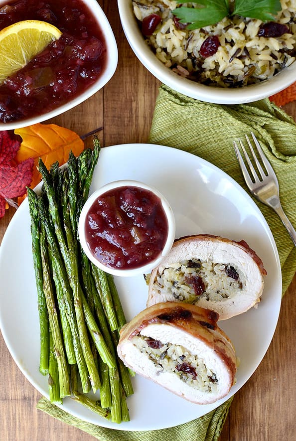 Bacon-Wrapped Turkey Breast with Wild Rice Stuffing and Cranberry Apple Chutney from Iowa Girl Eats  - If you are feeding a crowd this year, keep this Bacon-Wrapped Turkey Breast recipe in your back pocket for a festive meal this season. You’ll love it!