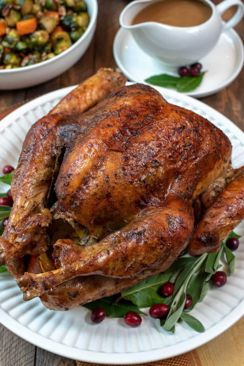 Dry Brine Turkey with garlic Butter Rub from Valerie’s Kitchen - The process of dry brining a turkey creates an incredibly tender, juicy result with beautifully browned, crispy skin. This Dry Brine Turkey with Garlic Butter Rub will make a gorgeous centerpiece for your holiday table.