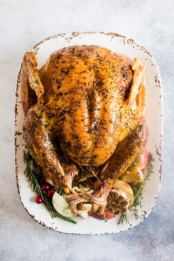 Garlic Herb Maple Roast Turkey from Nutmeg Nanny - This garlic herb maple roast turkey is packed full of flavor with just a touch of maple syrup sweetness. It’s the perfect addition to any holiday table! 