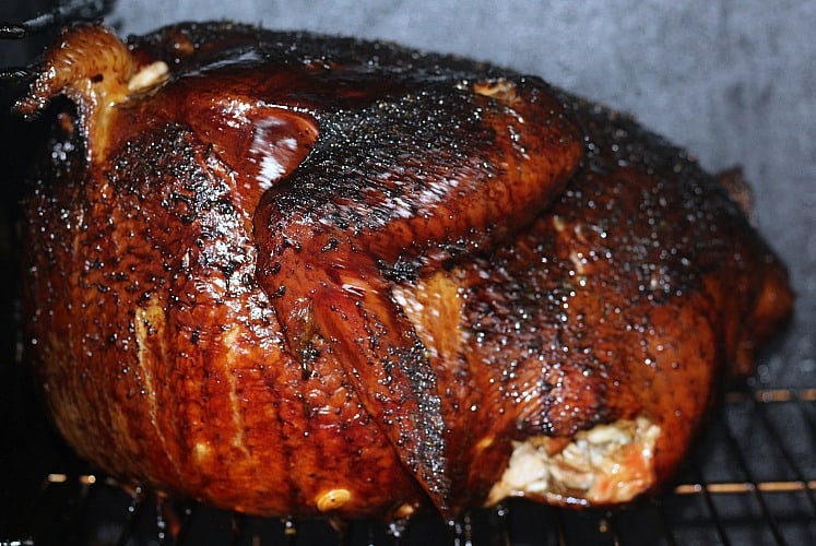 Smoked Turkey Recipe and Dry Rub Recipe from That Guy Who Grills This Smoked Turkey Recipe will be holiday dinner game changer! Smoking turkey on low heat in a smoker results in very deep flavor with the most delectable outer crust!  