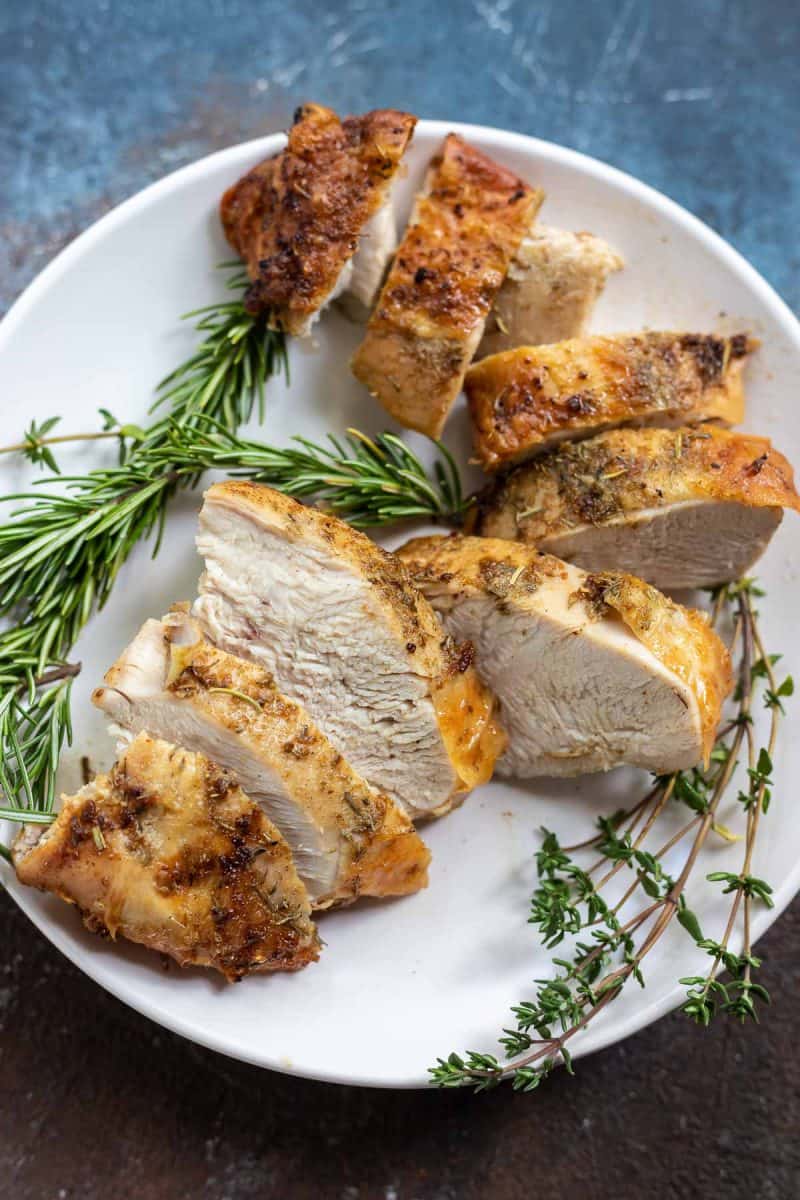 Air Fryer Turkey Breast from Tasty Air Fryer Recipes - Keep this Air Fryer Turkey Breast Recipe handy for the holiday season. This turkey breast cooked in an air fryer is a goof-proof and delicious way to prepare turkey for smaller holiday feasts.