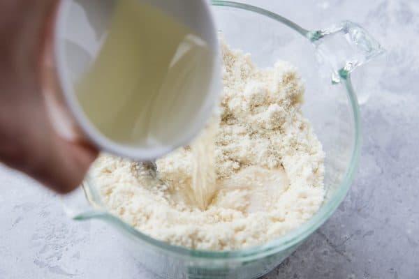 Pour in the melted coconut oil