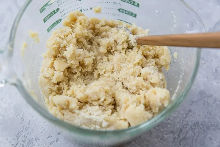 Mix pie crust mixture until well-combined and dough forms