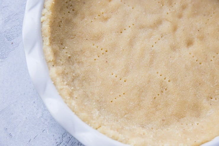 Poke holes in the pie crust to be sure it doesn't bow up