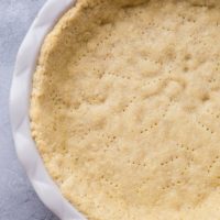 Almond Flour Pie Crust - keto, paleo, grain-free, dairy-free, and delicious! This pie crust recipe holds together very well and tastes just like regular pie crust