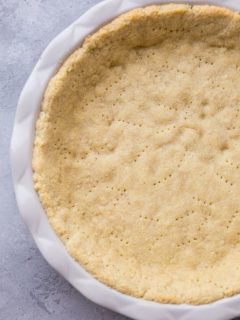 Almond Flour Pie Crust - keto, paleo, grain-free, dairy-free, and delicious! This pie crust recipe holds together very well and tastes just like regular pie crust