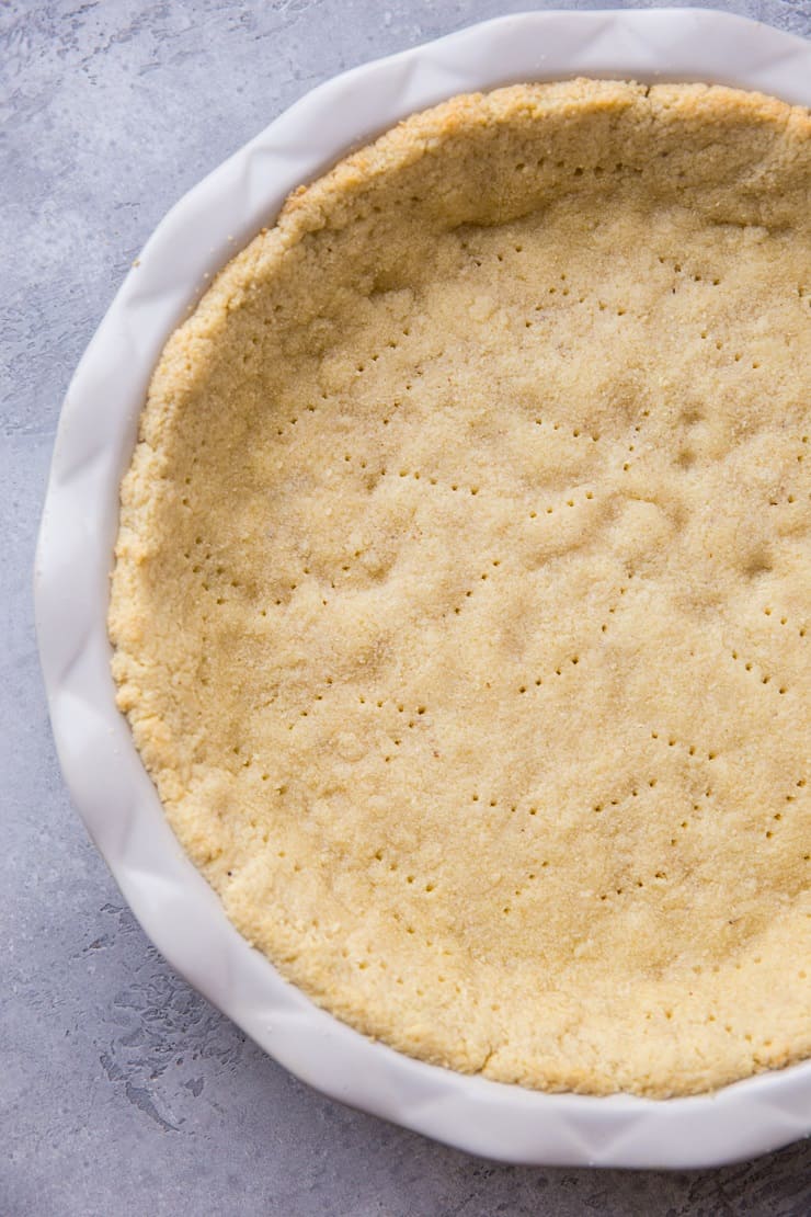 Almond Flour Pie Crust - keto, paleo, grain-free, dairy-free, and delicious! This pie crust recipe holds together very well and tastes just like regular pie crust