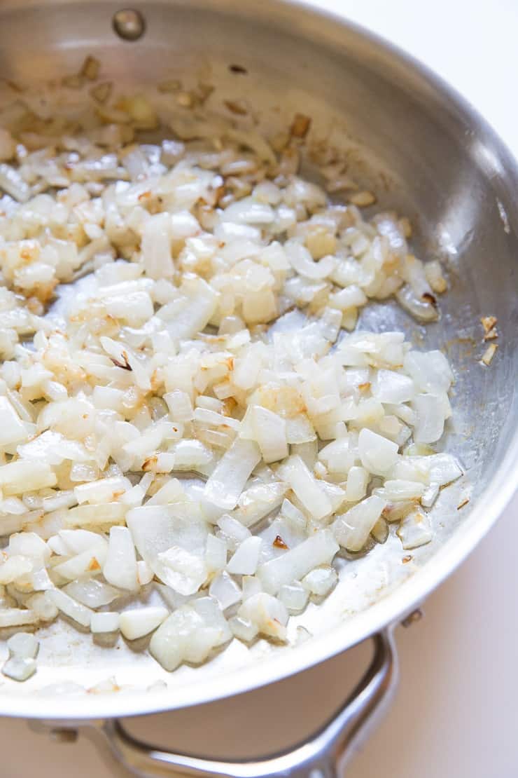 Sautéing onion in a stainless steel skillet