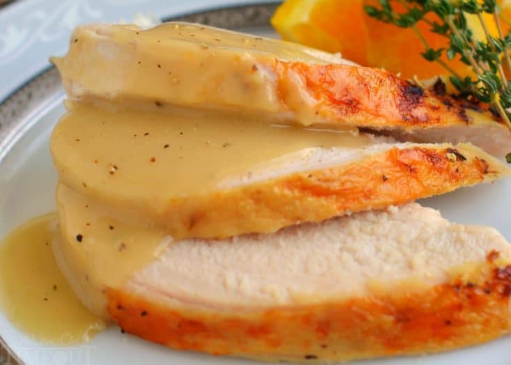 Crock Pot Turkey Breast with Herbs from Mom on Timeout - This Crockpot Turkey Breast recipe is hands down, the most amazing turkey you will ever eat! Juicy, tender, succulent and bursting with flavor, this easy recipe is a necessary addition to your holiday feast!