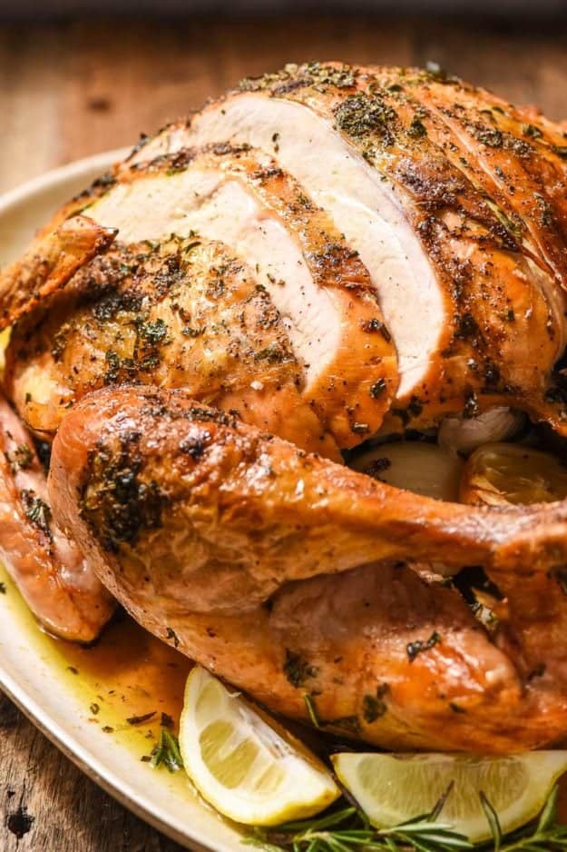 Easy Garlic Herb Oven Roasted Turkey  from NeighborFood  - A classic approach to your Thanksgiving centerpiece! This recipe provides the ultimate guide to roasting a turkey from start to finish and includes a video!