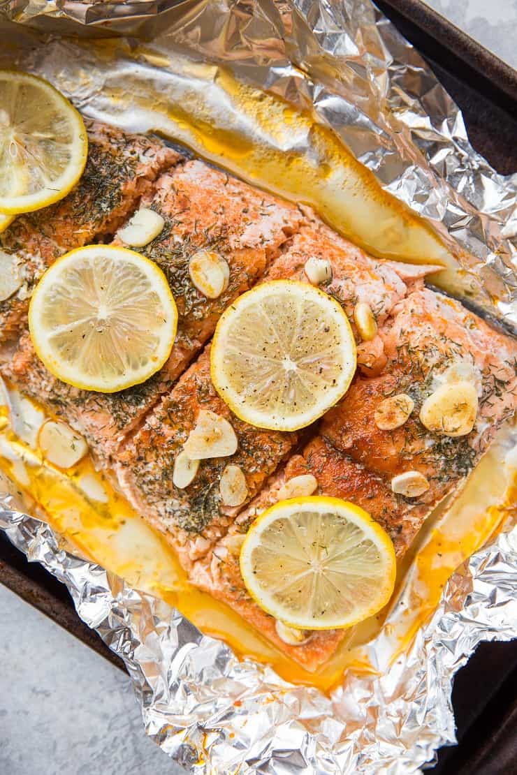 How to Bake Salmon in Foil with garlic and lemon - an easy dinner recipe that is healthy, paleo, keto, whole30, and delicious