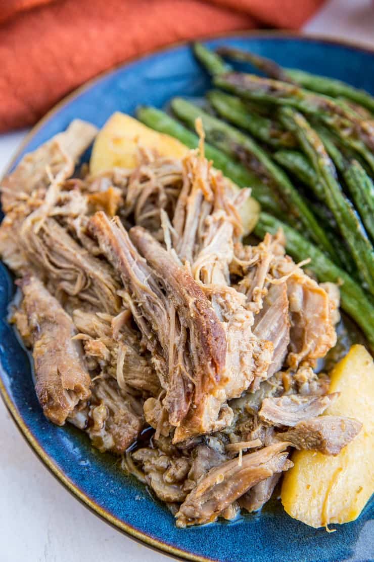 Instant Pot Pulled Pork and Apples - a super easy pulled pork recipe made in the Instant Pot with just a few ingredients. A healthy lower carb dinner recipe that is paleo and whole30