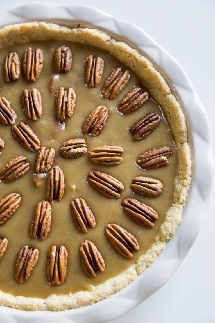 Arrange the rest of the pecan halves on top of the pie in a decorative fashion