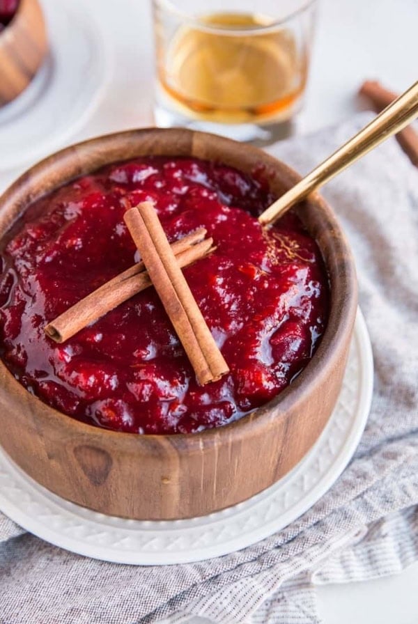 Maple Bourbon Cranberry Sauce with cinnamon and orange zest - a flavorful unique approach to homemade cranberry sauce for your Thanksgiving feast!