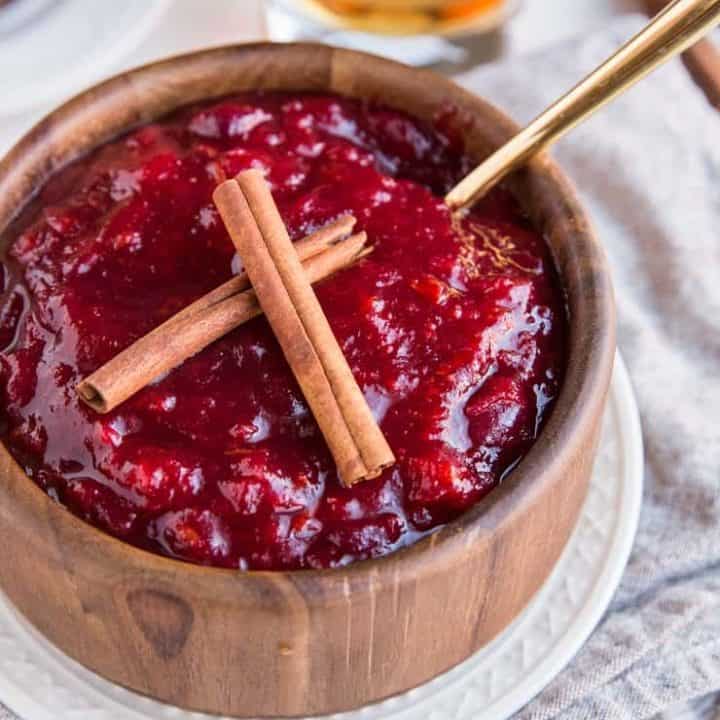 Maple Bourbon Cranberry Sauce with cinnamon and orange zest - a flavorful unique approach to homemade cranberry sauce for your Thanksgiving feast!