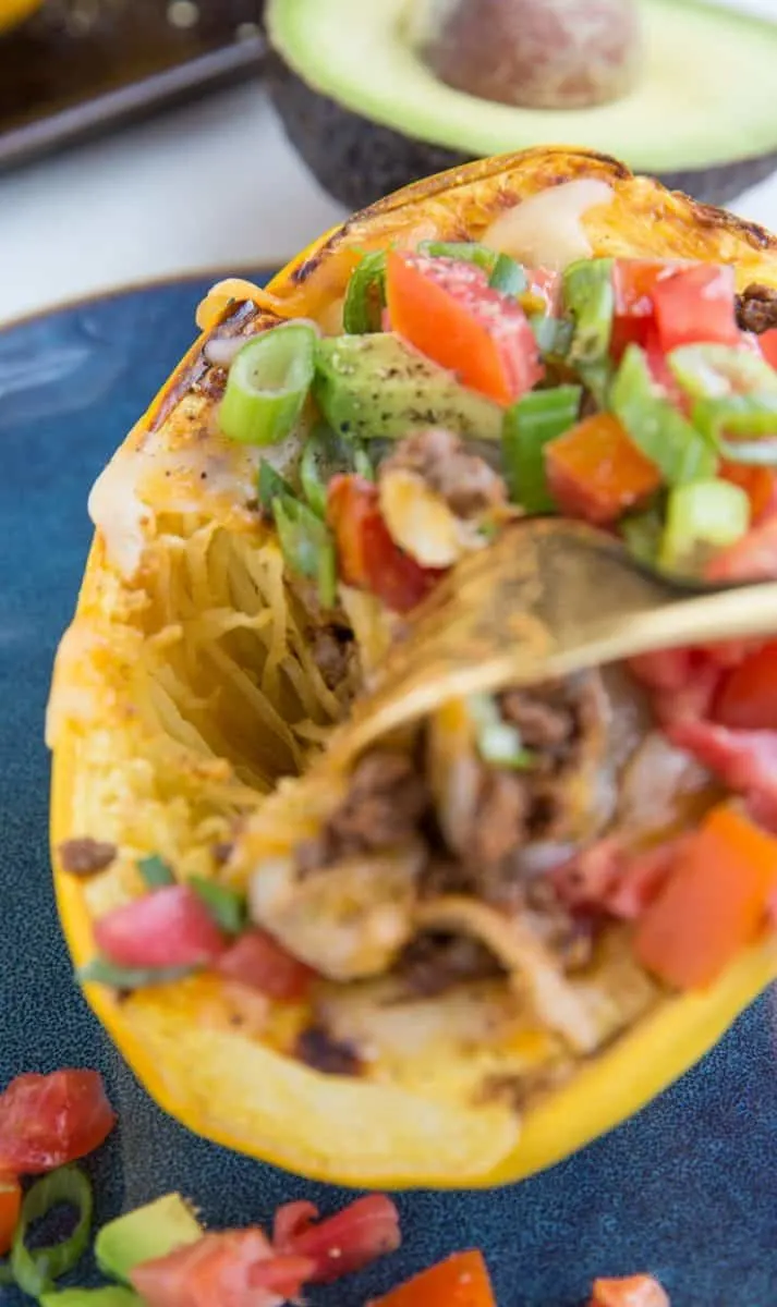Keto Spaghetti Squash Burrito Bowls with ground beef, avocado, tomato and green onion - a healthy low-carb meal