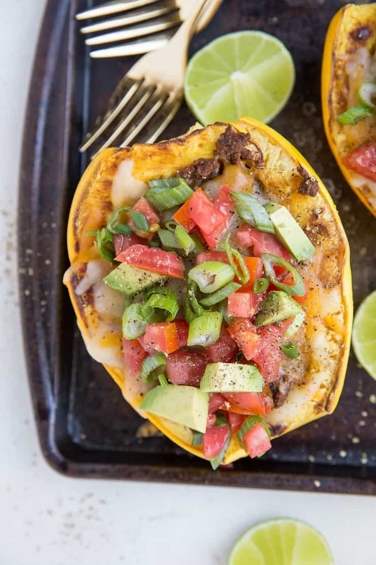 Keto Spaghetti Squash Burrito Bowls with ground beef, cheese, avocado and more - a low-carb, nutritious protein-packed dinner recipe.