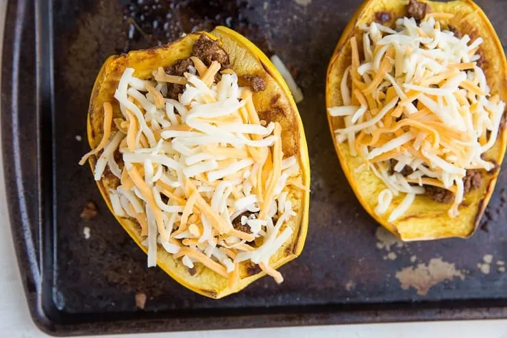 Spaghetti Squash stuffed with ground beef and sprinkled with cheese