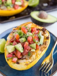 Spaghetti Squash Burrito Bowls with ground beef, cheese, tomatoes, avocado and more. An easy, healthy low-carb, keto dinner recipe.