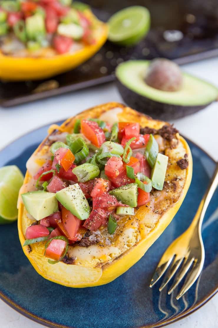 Spaghetti Squash Burrito Bowls with ground beef, cheese, tomatoes, avocado and more. Keto-friendly! An easy, healthy low-carb, keto dinner recipe.