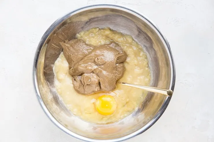 Whisk the eggs, banana, and almond butter together in a mixing bowl