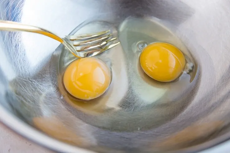whisk the eggs, coconut oil, and cider vinegar in a bowl