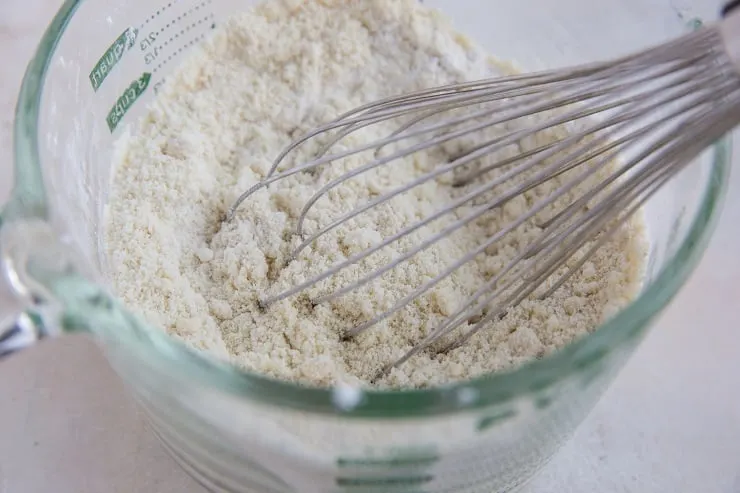 Stir together the almond flour, tapioca flour, sea salt and baking powder