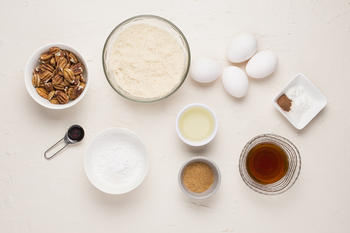 Ingredients for paleo almond flour coffee cake sitting on a backdrop.
