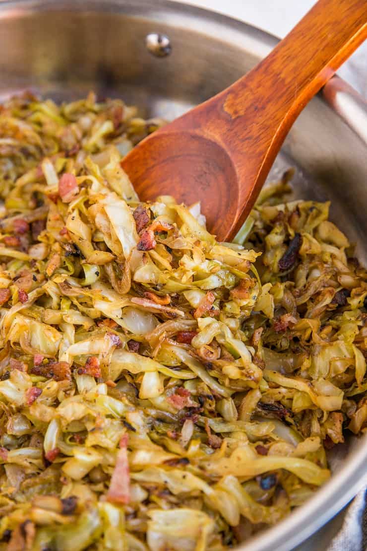 Caramelized Cabbage and Bacon is an easy side dish with cabbage, onions, garlic, and bacon! Use it as a side, or as a condiment, like caramelized onions